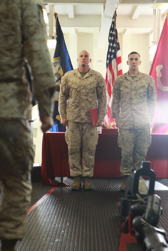 Gunnery Sgt. Lewis Layton, center, attends a graduation for corporals and petty officers third class who completed formal noncommissioned officer leadership training aboard USS Makin Island here May 16. The Marines serve with the 11th Marine Expeditionary Unit, which embarked the ship, as well as USS New Orleans and USS Pearl Harbor in San Diego Nov. 14. The unit is on a seven-month deployment to the Western Pacific, Horn of Africa and Middle East regions.