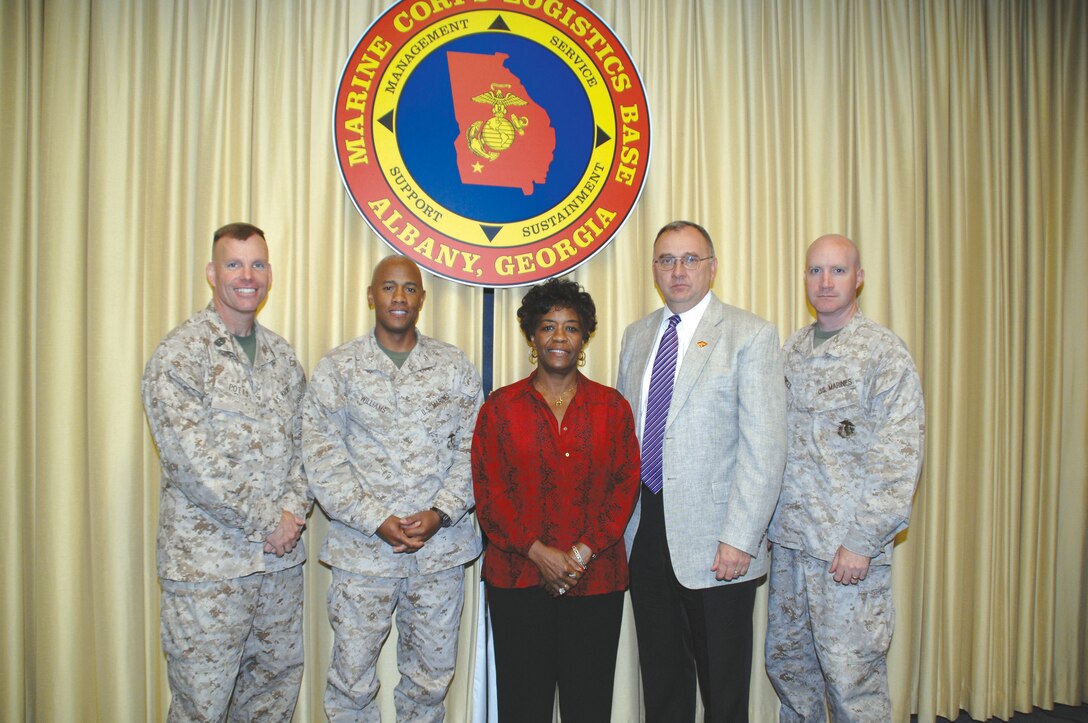 Marine Corps Logistics Base Albany officials pose with Mayor Dorothy Hubbard, City of Albany, during her visit here, May 7.
