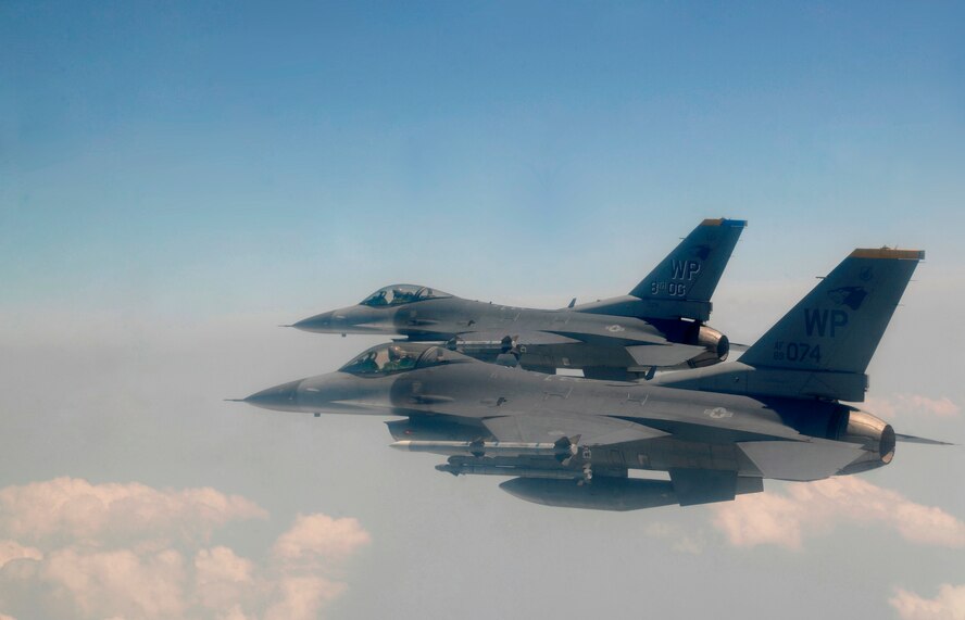 Col. Scott L. Pleus, 8th Fighter Wing commander, flies his final flight as the wing commander of the Wolf Pack alongside Col. Stephen C. Williams, 8th FW vice commander, in their F-16 Fighting Falcons at Kunsan Air Base, Republic of Korea, May 16, 2012. The fini-flight is a long standing practice of both the United States and Royal Australian Air Forces to commemorate a commander’s departure from an installation. (U.S. Air Force photo/Staff Sgt. Rasheen A. Douglas)