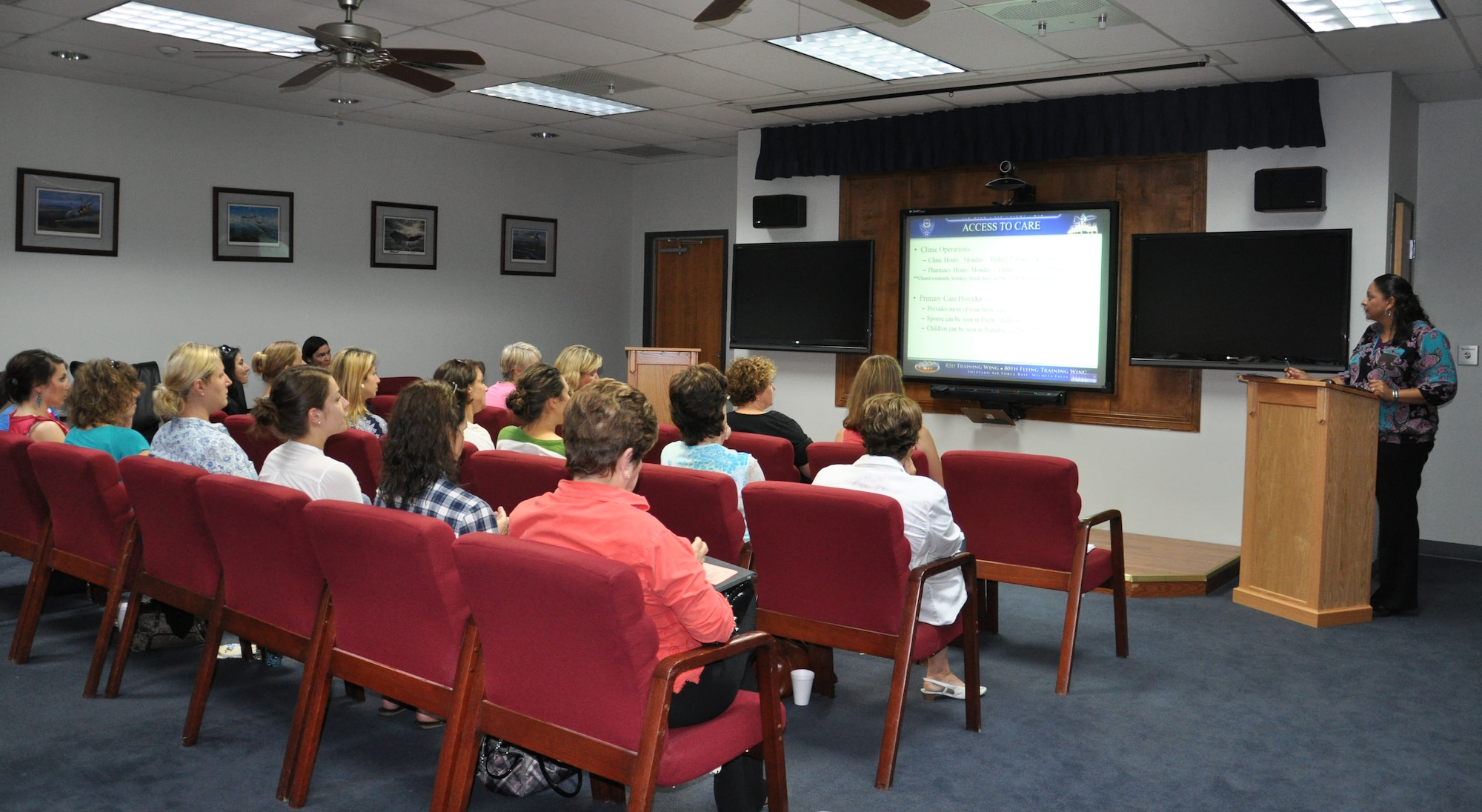 Mrs. Darlene Newsome, representing TRICARE, breifed and answered questions at the NATO-Link Orientation to 19 spouses on May 15. (U.S. Air Force Photo/ Second Lieutenant Sara Harper)
