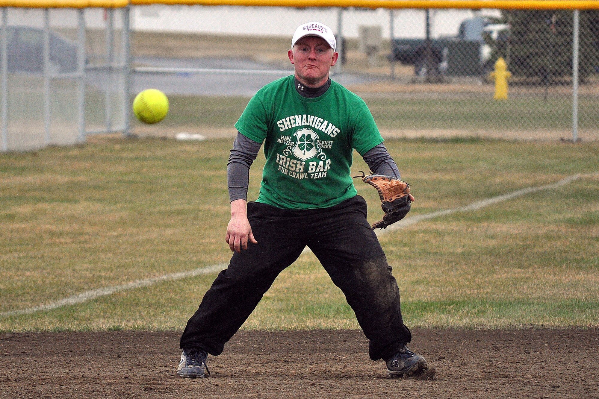 Third baseman David Dearing, 98th Maintenance Company, prepares to field a ground ball against E Troop, 1st Squadron (Airborne), 40th Cavalry Regiment in the second championship game of the JBER-Richardson pre-season softball tournament Saturday. (U.S. Air Force photo/John Pennell)
