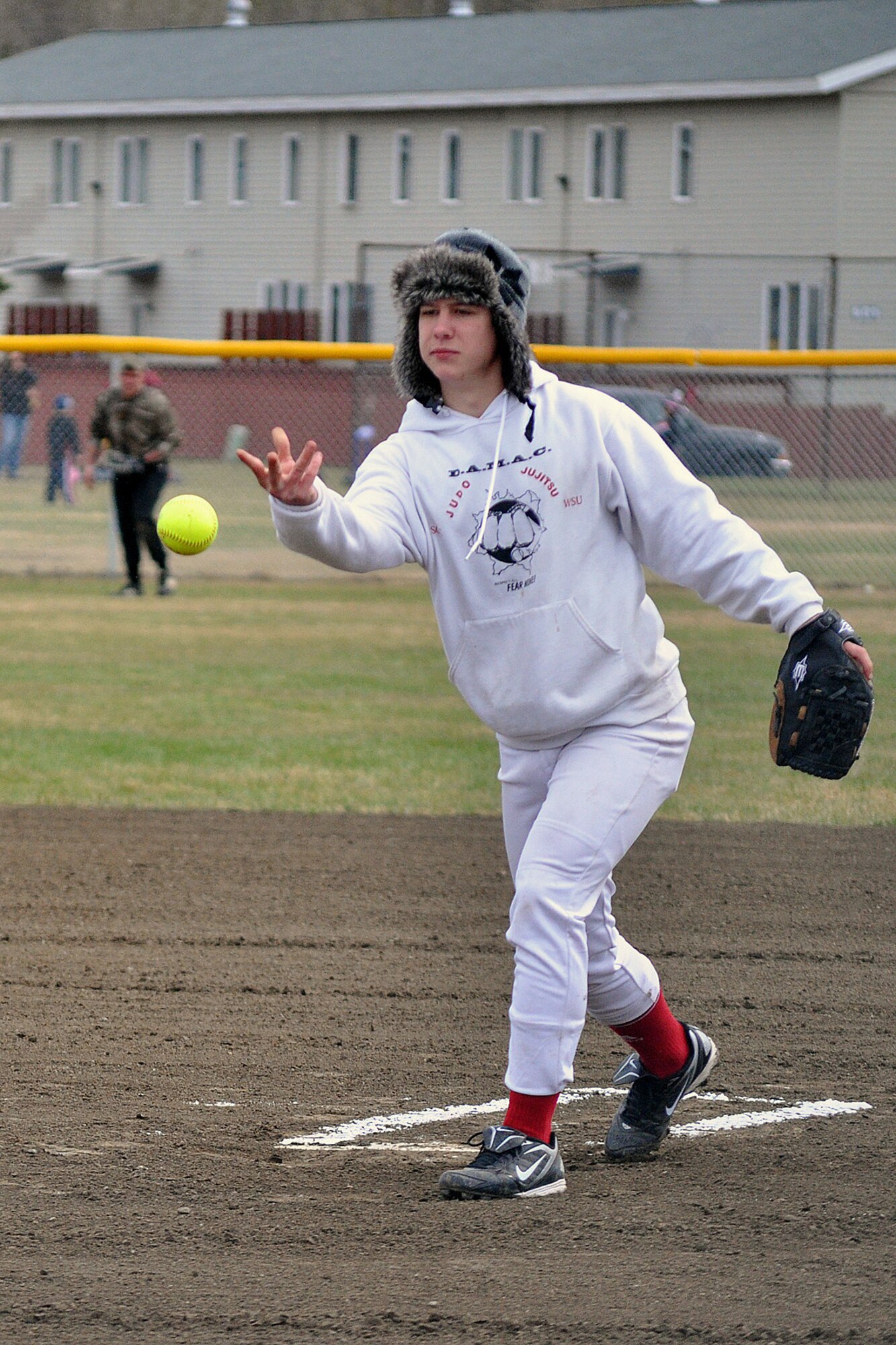E Troop, 1st Squadron (Airborne), 40th Cavalry Regiment pitcher Mitchell Gehle, tosses an offering toward the plate in the first championship game of the JBER-Richardson pre-season softball tournament Saturday at Buckner Physical Fitness Center?s softball field 3. The 98th Maintenance team stopped E Troop in consecutive games to win the tournament. (U.S. Air Force photo/John Pennell)