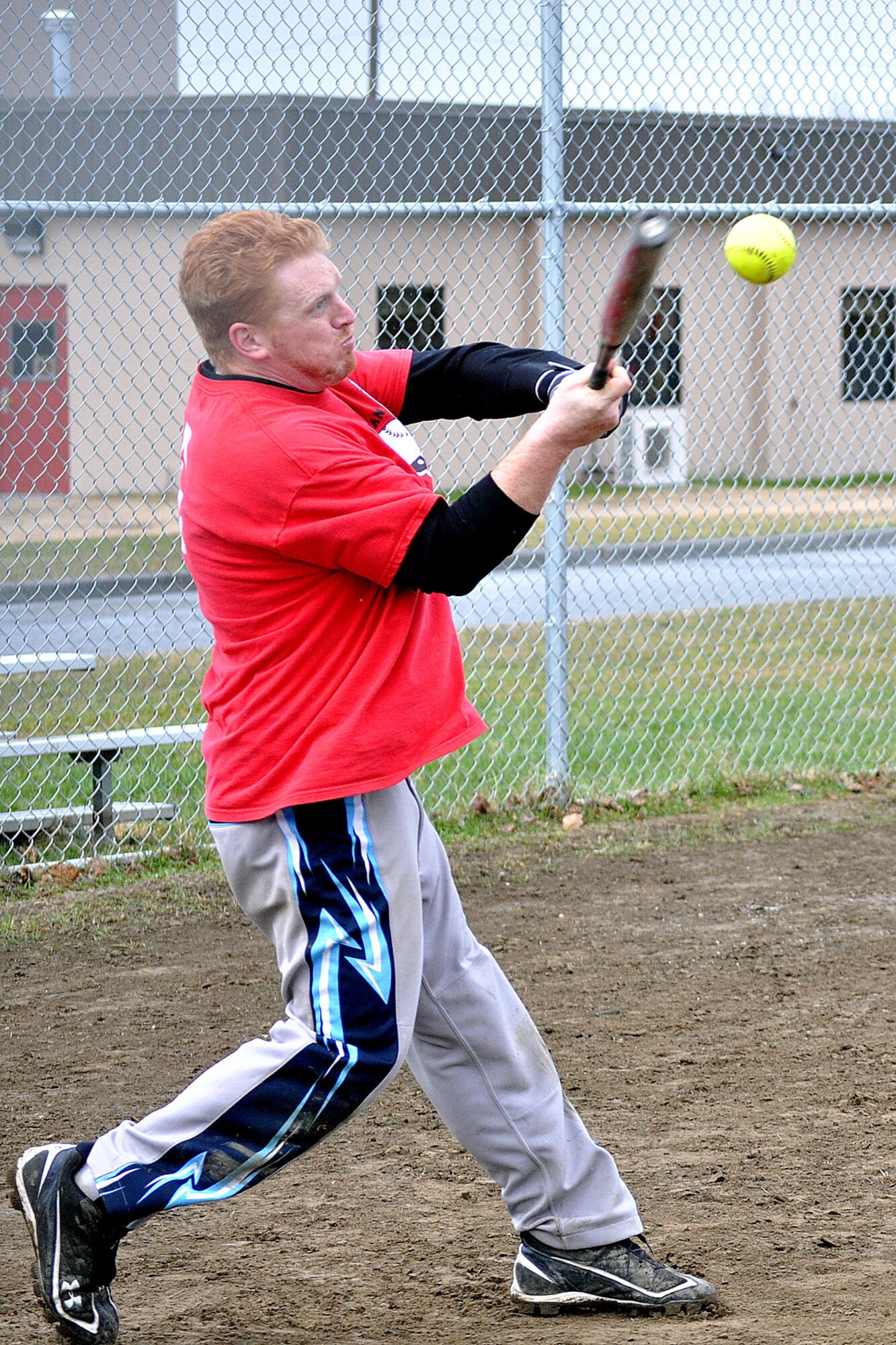 Dustin Baldwin, 98th Maintenance Company, takes a swing in the third-place game of the JBER-Richardson pre-season softball tournament Saturday at Buckner Physical Fitness Center's softball field 2. The 98th Maintenance team cruised past 95th Chemical Company, 20-10, to advance to the tournament championship. (U.S. Air Force photo/John Pennell)