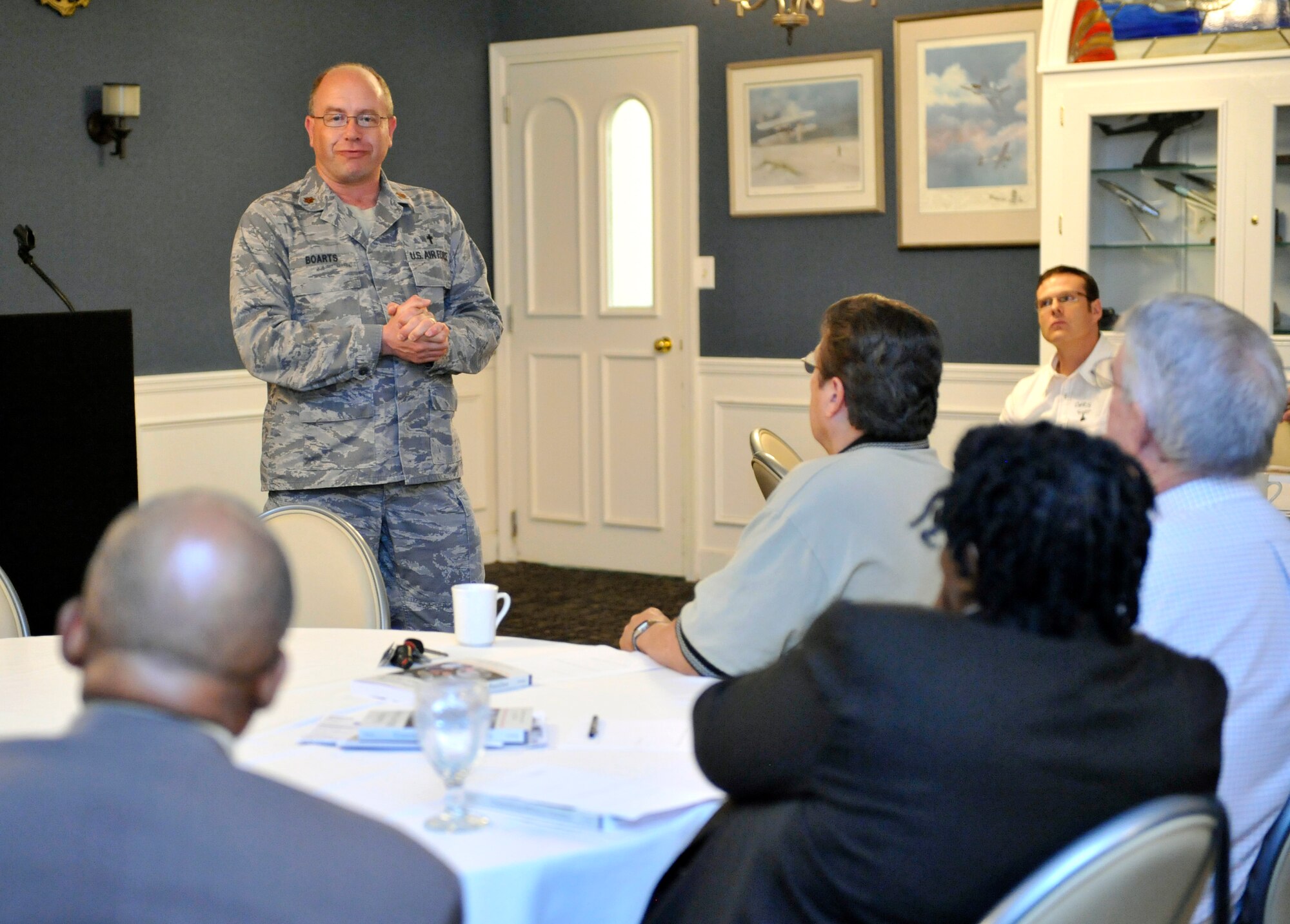 U.S. Air Force Chaplain (Maj.) Matthew Boarts, 20th Fighter Wing chaplain, speaks with local spiritual leaders from Sumter community during Clergy Day at Shaw Air Force Base, S.C., May 17, 2012. One of the main goals of Clergy Day is to build relationships within the spiritual community and to educate religious leaders to better understand military needs. Clergy Day will be held several times throughout the year to build stronger ties within the religious community. (U.S. Air Force photo by Senior Airman Amber E. N. Jacobs/Released)