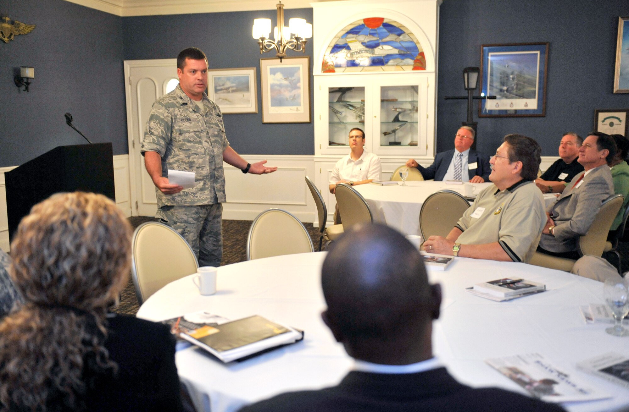 U.S. Air Force Col. Donavan Godier, 20th Fighter Wing vice commander, speaks with local clergy members from Sumter community during Clergy Day at Shaw Air Force Base, S.C., May 17, 2012. Clergy Day is a day for leaders from the spiritual community to come together and meet with base chaplains and to discuss the spiritual needs of military families in their congregation. (U.S. Air Force photo by Senior Airman Amber E. N. Jacobs/Released)