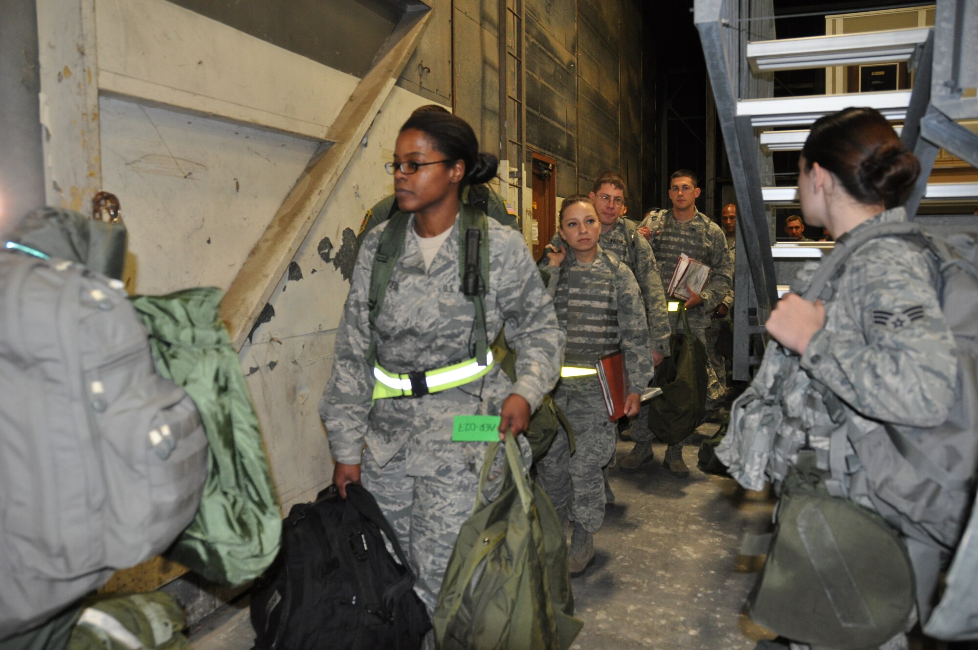 TRAVIS AIR FORCE BASE, Calif. -- Members of the 349th Air Mobility Wing and 60th AMW teamed up in an Operational Readiness Exercise here during the week of May 7, 2012. During the six-day –long mock deployment, Airmen utilized their extensive training in post-attack reconnaissance, self-aid buddy care, defensive tactical warfare, and chemical warfare mission oriented protective posture, (MOPP,) while maintaining their ability to work in their respective career fields. (U.S. Air Force photo / Senior Airman Amelia Leonard)