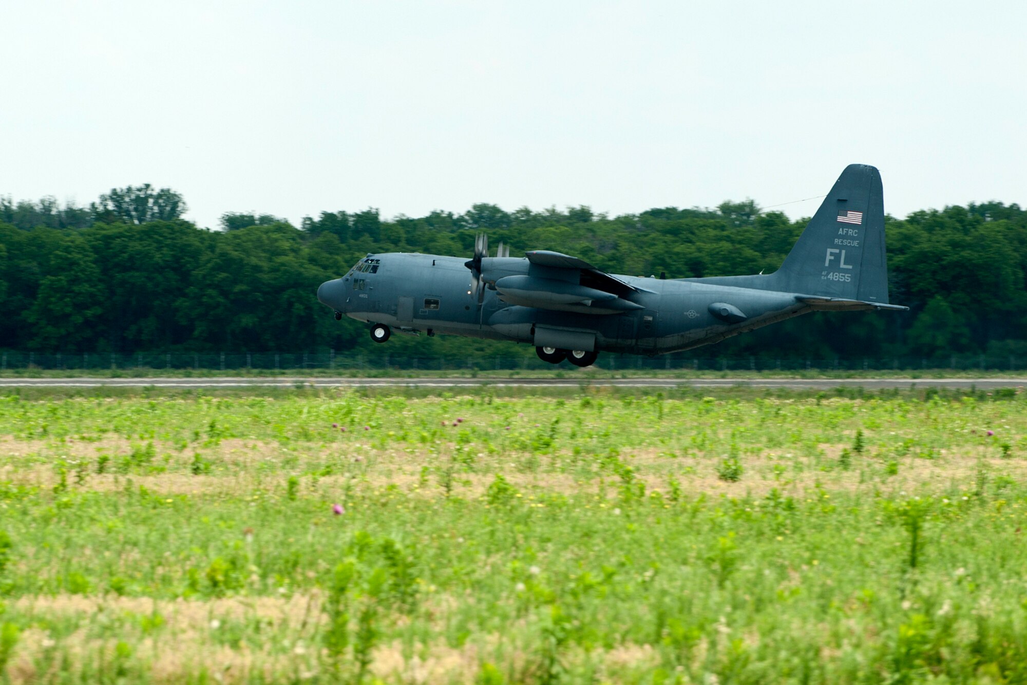 An HC-130 King lifts off the runway on Barksdale Air Force Base, La., May 16, 2012. The aircraft is assigned to the 920th Rescue Wing, Patrick Air Force Base, Fla., and is at Barksdale supporting the Patriot Saint exercise, which presents realistic combat search and rescue missions. (U.S. Air Force photo by Master Sgt. Greg Steele/Released)