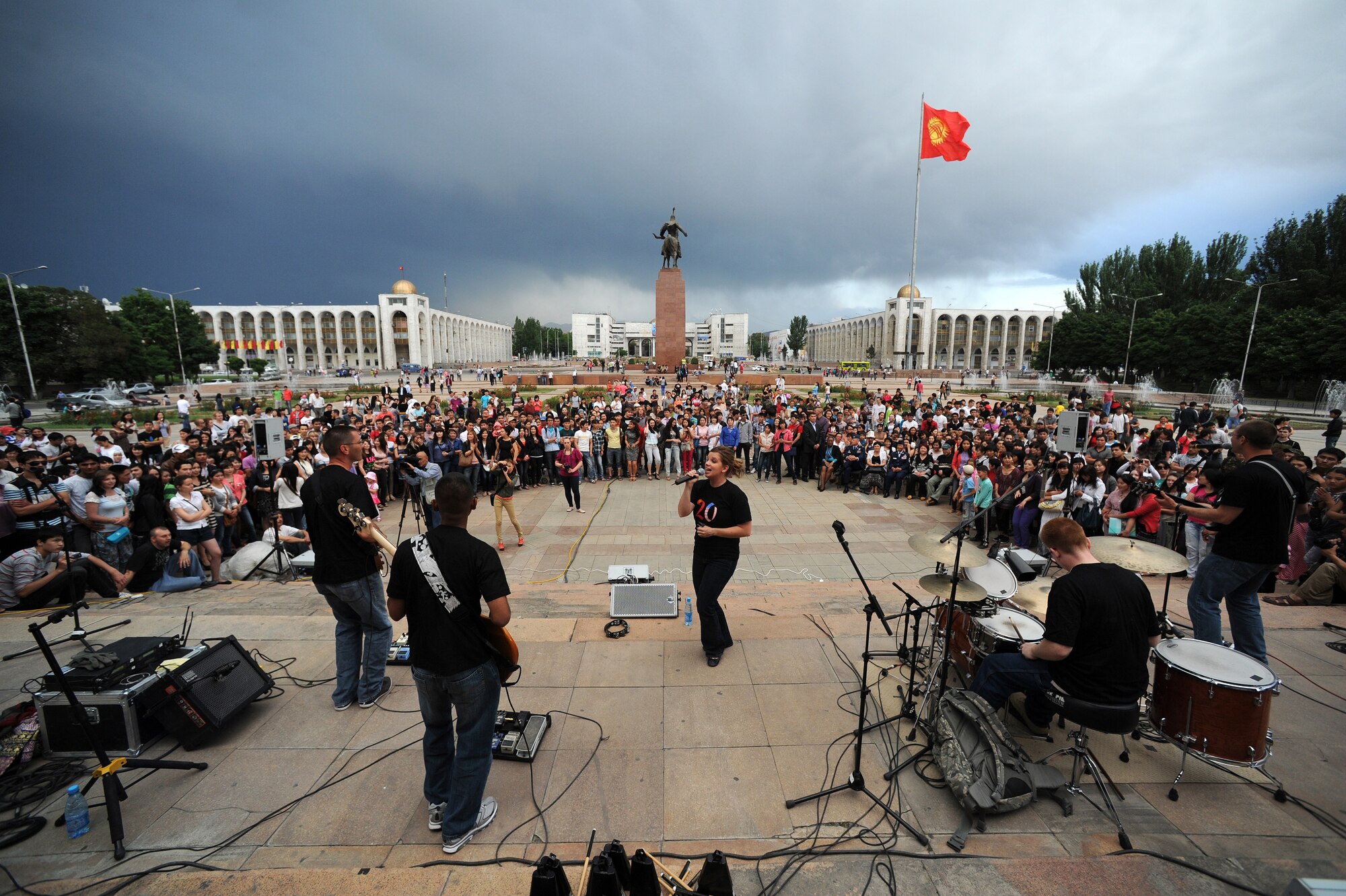 U.S. Air Forces Central Band "Night Wing" performs for an audience of more than 2,000 people in Ala Too Square, Bishkek, Kyrgyzstan, May 16, 2012. "This was the first dance circle that I've seen with this group," said Airman 1st Class Dave Wilson, sound engineer for Night Wing. "It made it wicked-hard for me to mix, but everyone enjoyed [the show]." Night Wing is deployed from Offutt Air Force Base, Neb. (U.S. Air Force photo/Master Sgt. Tracy L. DeMarco)