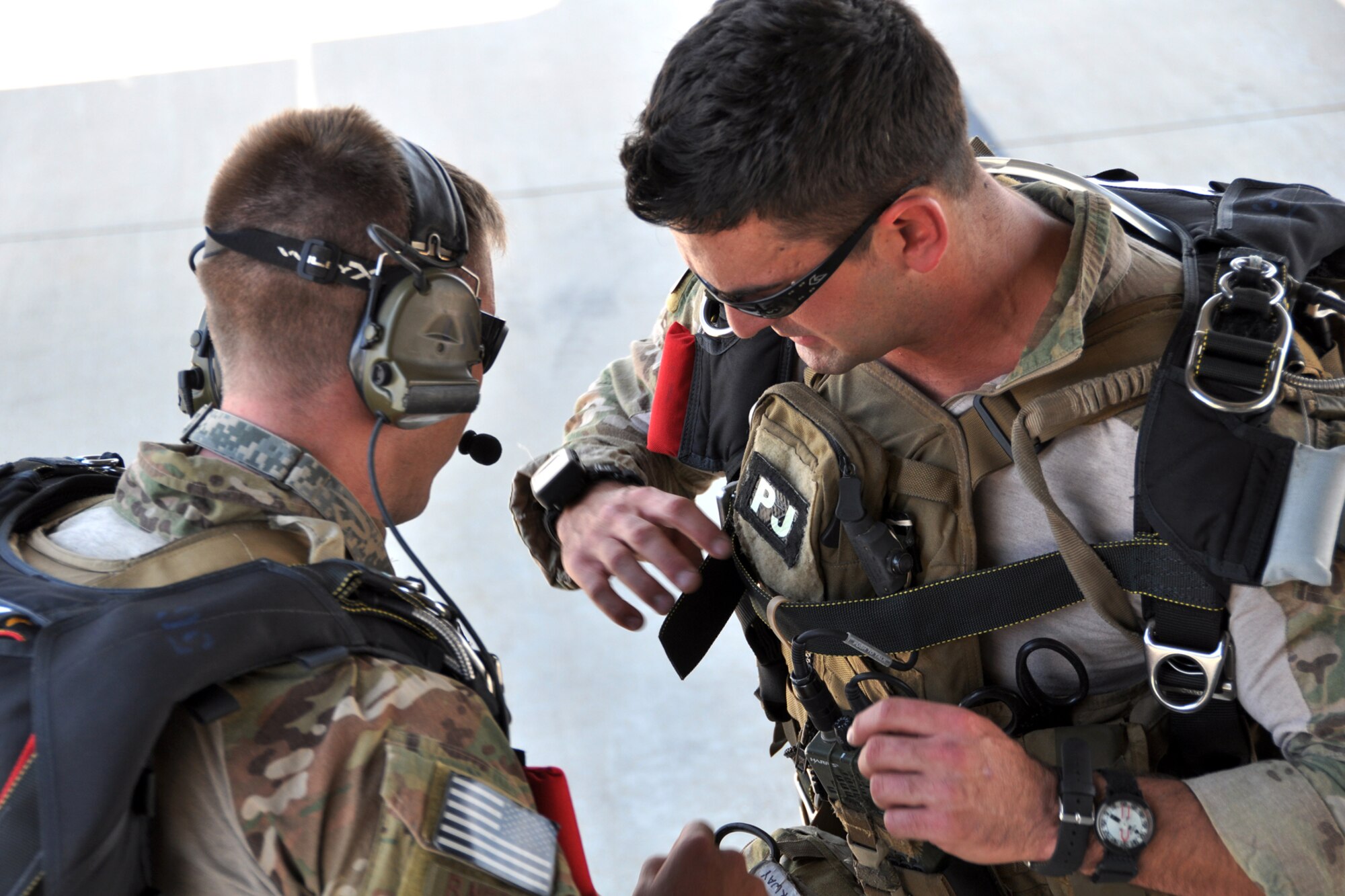 Pararescuemen from the 920th Rescue Wing, Patrick Air Force Base, Fla., prepare for a combat search and rescue (CSAR) mission in support of the Patriot Saint exercise, Barksdale Air Force Base, La., May 16, 2012. The exercise is conducted and led by Air Force Reserve Command's 10th Air Force and presents realistic CSAR missions and is a joint exercise with the Army at Fort Polk, La. (U.S. Air Force photo by Master Sgt. Joshua Woods/Released)