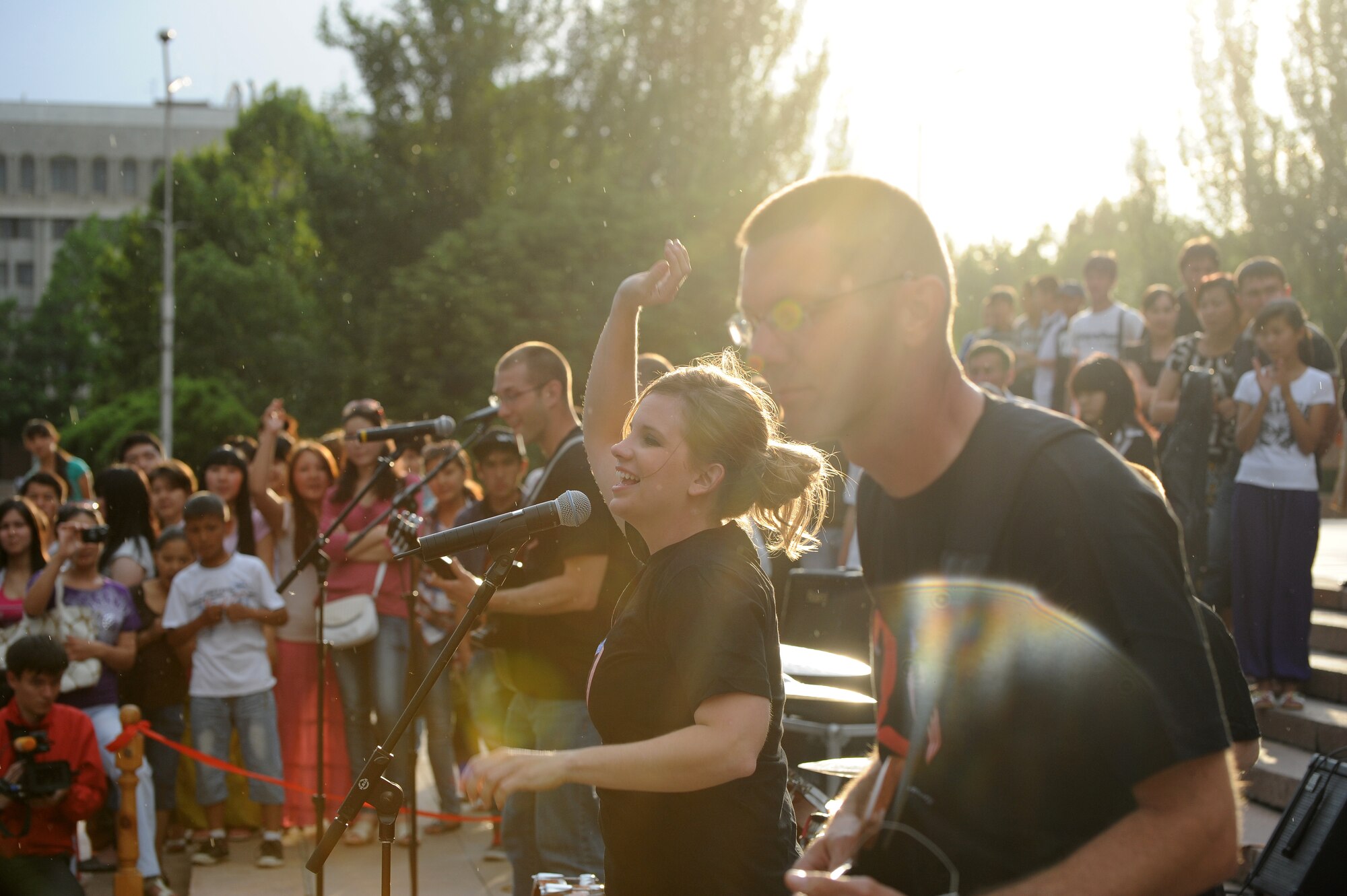 Airman 1st Class Melissa Rager, a vocalist in the U.S. Air Forces Central Band "Night Wing," performs for a crowd of more than 2,000 people in Ala Too Square, Bishkek, Kyrgyzstan, May 16, 2012.  Night Wing is deployed from Offutt Air Force Base, Neb., and is touring Kyrgyzstan for 10 days. The performance in Ala Too Square was from the steps of the Kyrgyz State Museum of History to celebrate International Museum Day - May 18.  (U.S. Air Force photo/Master Sgt. Tracy L. DeMarco)