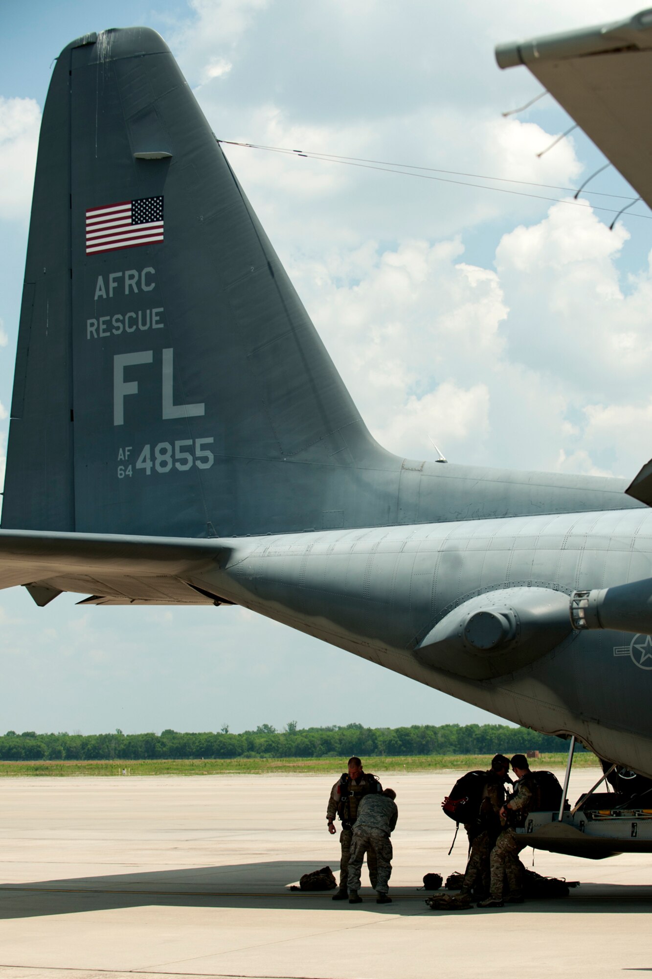 Pararescuemen from the 920th Rescue Wing, Patrick Air Force Base, Fla., prepare for a combat search and rescue (CSAR) mission in support of the Patriot Saint exercise, Barksdale Air Force Base, La., May 16, 2012. The exercise was conducted and led by Air Force Reserve Command's 10th Air Force and presents realistic CSAR missions and is a joint exercise with the Army at Fort Polk, La. (U.S. Air Force photo by Master Sgt. Greg Steele/Released)