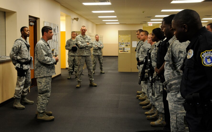 Col. Andrew Gebara, 2nd Bomb Wing commander, speaks to members of the 2nd Security Forces Squadron guard mount on Barksdale Air Force Base, La., May 16. Gebara toured the squadron to introduce himself as the new wing commander. (U.S. Air Force photo/Airman 1st Class Andrew Moua)