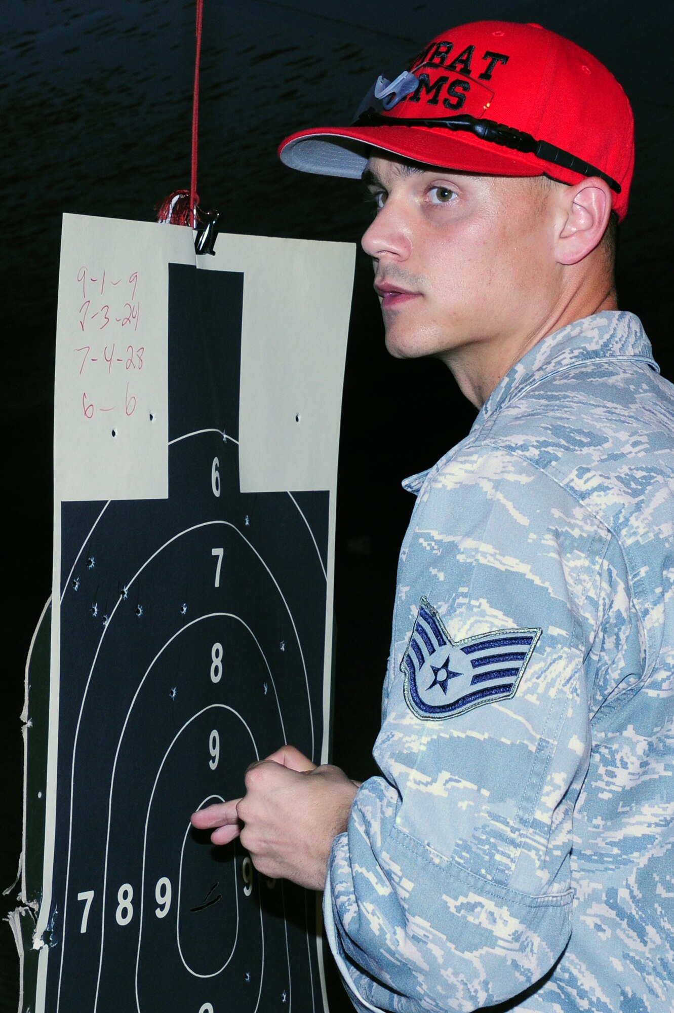 Staff Sgt. Dominick Pondant, 628th Security Forces Squadron Combat Arms instructor out of Joint Base Charleston, S.C., tallies points, May 16, 2012. Security Forces Combat Arms holds this shooting competition annually for for national police week to pay respects to fallen civilian and military police officers. (U.S. Air Force photo/ Airman 1st Class Chacarra Walker)
 

