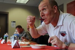Rob Concannon, South Carolina Stingrays President, was a judge at the 628th Security Forces Squadron Chili Cook Off, May 16, 2012 at Joint Base Charleston, S.C. This event was part of National Police Week, which occurs annually during the week of May 15, recognizing the service and sacrifice of U.S. law enforcement personnel. (U.S. Air Force photo/Airman 1st Class Ashlee Galloway)