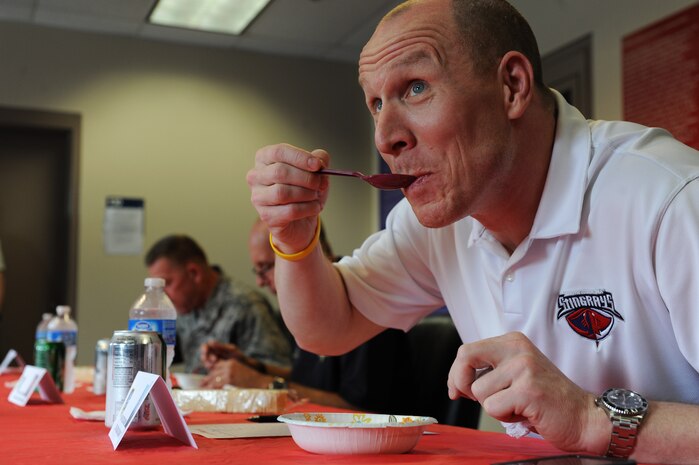 Rob Concannon, South Carolina Stingrays President, was a judge at the 628th Security Forces Squadron Chili Cook Off, May 16 at Joint Base Charleston - Air Base. This event was part of National Police Week, which occurs annually during the week of May 15, recognizing the service and sacrifice of U.S. law enforcement personnel. (U.S. Air Force photo/Airman 1st Class Ashlee Galloway)