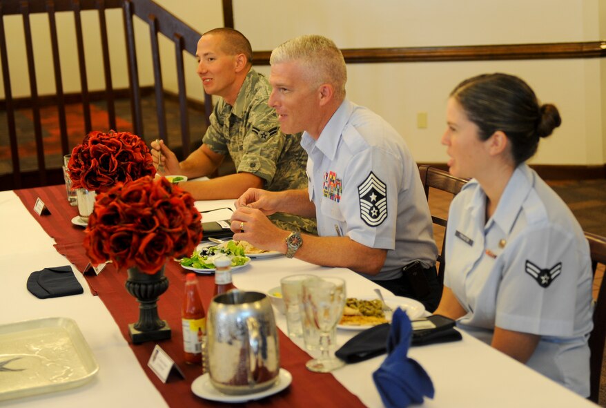 U.S. Air Force Chief Master Sgt. Robert Brooks, 9th Air Force command chief, has lunch with Moody Airmen at Moody Air Force Base, Ga., May 14, 2012. Brooks had lunch with Airmen during his visit to Moody and discussed the Wing’s role in the 9th Air Force’s mission. (U.S. Air Force photo by Airman 1st Class Douglas Ellis/Released)
