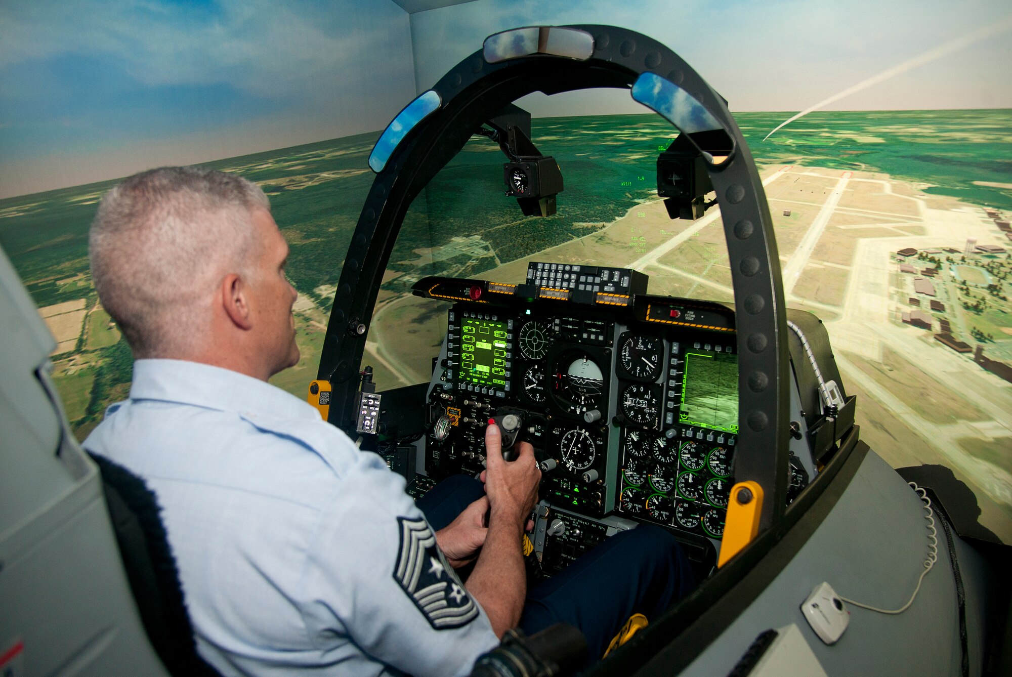U.S. Air Force Chief Master Sgt. Robert D. Brooks, 9th Air Force command chief, participates in an A-10C Thunderbolt II flight simulator at Moody Air Force Base Ga., May 14, 2012. Brooks was tested on how well he could maneuver and fire the A-10. (U.S. Air Force photo by Airman 1st Class Paul Francis/Released)

