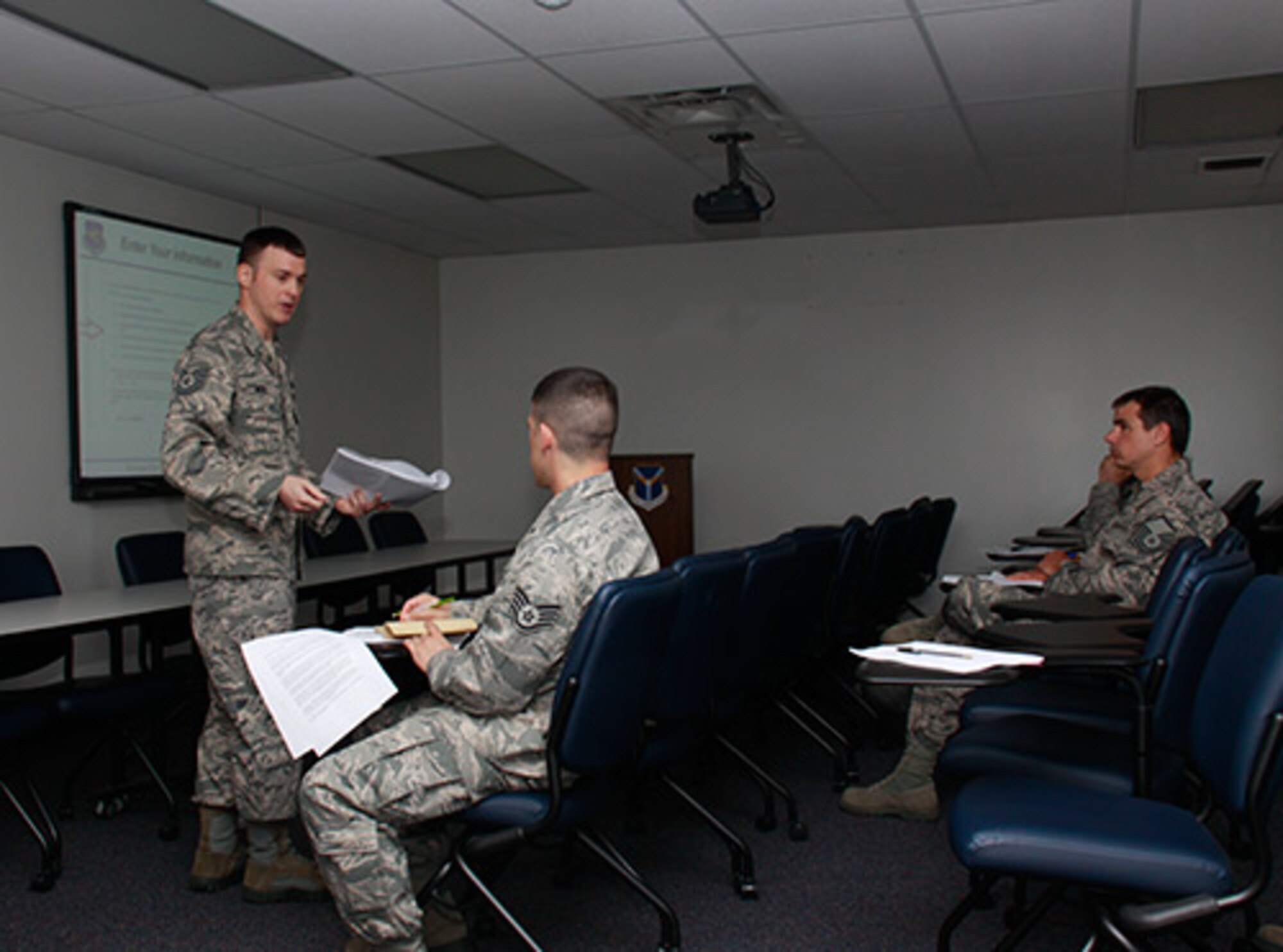 PITTSBURGH IAP ARS -- Tech. Sgt. Tom Merz, a 911th Airlift Wing family readiness specialist, instructs fellow Airmen of the 911th AW on resume writing for federal employment in the “Steel Room,” next to the Family Readiness office, May 15, 2012. Merz is piloting this new class at the 911th AW to bring awareness to participants about the job possibilities within the federal government and also educate them on veterans’ preference. This class will be held again on May 17, 2012 at 10 a.m. in the “Steel Room.” (U.S. Air Force photo by Airman 1st Class Justyne Obeldobel/Released)