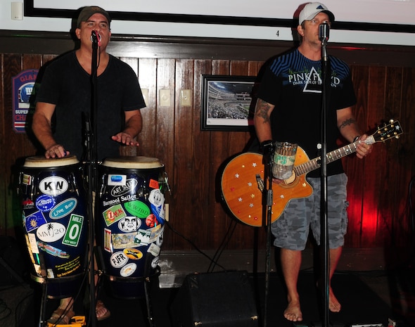 The Larry David Project band, plays during the Grand Opening of Rookies Sports Grill at Joint Base Charleston May 11, 2012. Rookies Sports Grill is a new spot on base for community members to enjoy great food while watching some of their favorite sports teams on the big screen. (U.S. Air Force photo/Airman 1st Class Chacarra Walker)