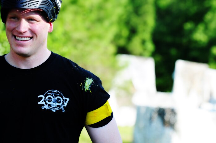 Staff Sgt. Adam Konstanzer, 628th Security Forces Squadron defender, walks off the field after a  paintball match against firefighters from the 628th Civil Engineer Squadron firefighters while competing in the "Guns and Hoses" fitness challenge, May 15 at Joint Base Charleston - Air Base, S.C.  The 628th SFS hosted the firefighters in a day full of competition known as the "Guns and Hoses" fitness challenge.  The competitions included a paintball match, defender ball and a softball game.  The event kicked off National Police Week, which occurs annually during the week of May 15.  It recognizes the service and sacrifice of U.S. law enforcement personnel.  (U.S. Air Force photo/Staff Sgt. Nicole Mickle)  