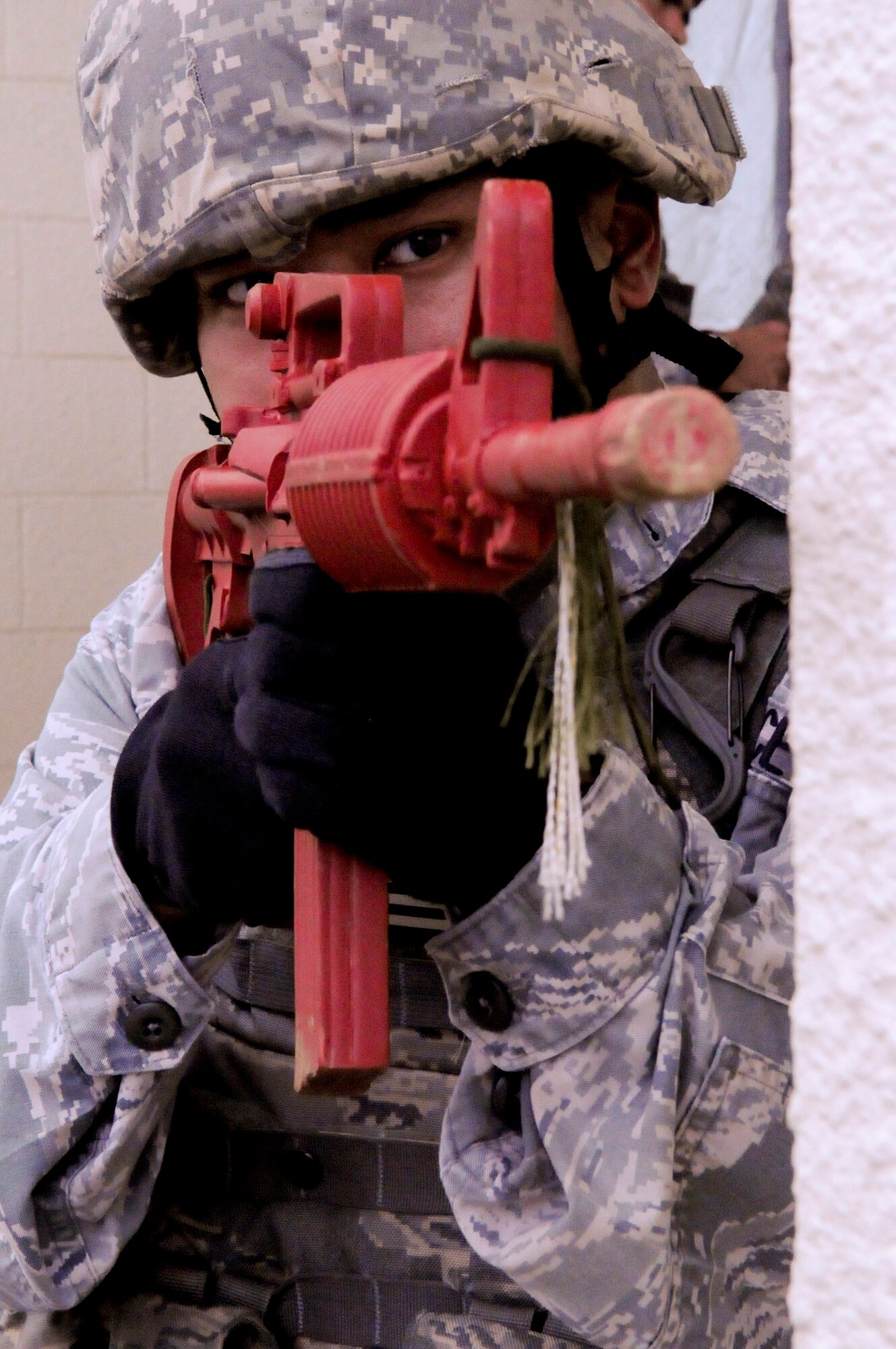 Each member of 18th Security Forces Squadron maintains a vigilant watch on the building entryway of an active shooter scenario during local operational readiness exercise Beverly High 12-4 on Kadena Air Base, Japan, May 16, 2012. Attention to detail is a crucial step while conducting scenarios during LOREs to ensure the safety of both victims and responders. (U.S. Air Force photo/Airman Tara A. Williamson)