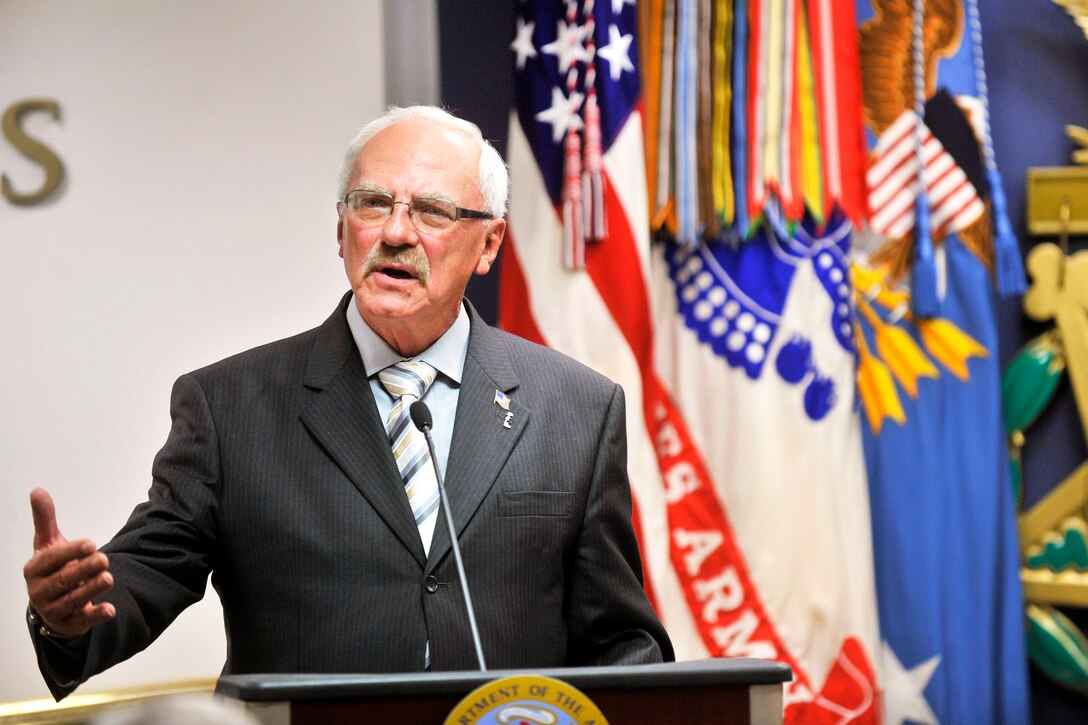 George Sabo, brother of Medal of Honor recipient Army Spc. 4 Leslie H. Sabo Jr., speaks about his borther's life during the ceremony to posthumously induct the Vietnam-era soldier into the Hall of Heroes at the Pentagon, May 17, 2012.