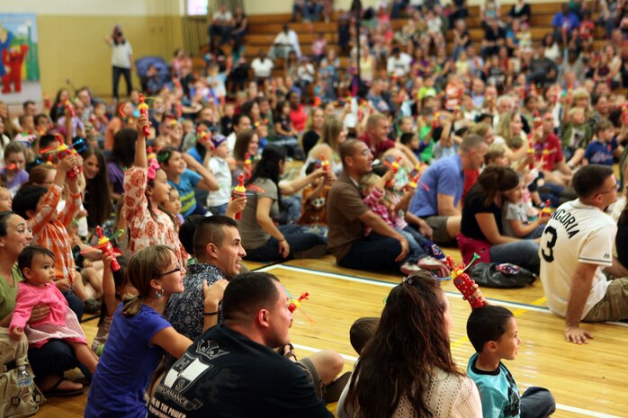 Kids and families from Marine Corps Air Station New River went to see the USO performance of Sesame Street Live at the air station fitness center, April 28. The show featured Muppets singing and dancing as well as discussing subjects relating to military families.