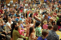 Kids and families from Marine Corps Air Station New River went to see the USO performance of Sesame Street Live at the air station fitness center, April 28. The show featured Muppets singing and dancing as well as discussing subjects relating to military families.