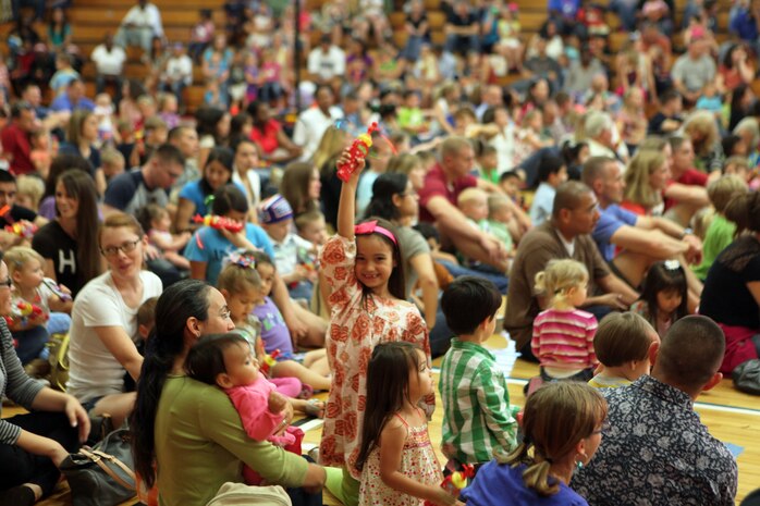 Kids and families from Marine Corps Air Station New River went to see the USO performance of Sesame Street Live at the air station fitness center, April 28. The show featured Muppets singing and dancing as well as discussing subjects relating to military families.