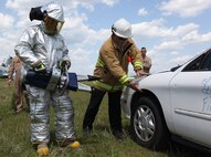 Aircraft Rescue and Firefighting Marines aboard Marine Corps Air Station New River practice vehicle extrication techniques at the ARFF training pit, April 24. Vehicle extrication is the process of creating an entry point into a vehicle that has been involved in a motor accident when conventional means of exit are impossible.