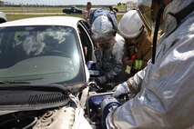 Aircraft Rescue and Firefighting Marines aboard Marine Corps Air Station New River are taught different vehicle extrication techniques at the ARFF training pit, April 24. Some of the ARFF Marines have had little training with these techniques since they were last at their schoolhouse.