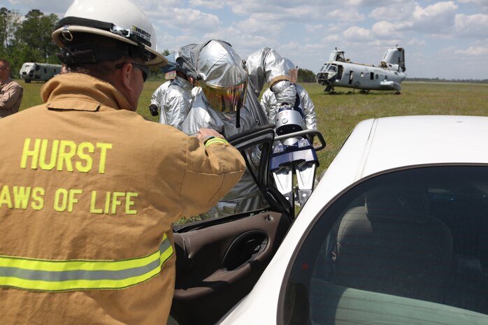 Aircraft Rescue and Firefighting Marines aboard Marine Corps Air Station New River are taught new techniques of vehicle extrication when conventional means are not possible, April 24. The Marines were reminded that an accident site will never be a picture-perfect job and they will most likely always have to think outside the box.