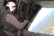 Sgt. Joshua L. Fairchild, a crew chief with Marine Medium Tiltrotor Training Squadron 204, stows gear during flight training, May 3. VMMT-204 is responsible for training all Marine MV-22B Osprey pilots and crew chiefs. During this flight, the instructors guided the students through multiple scenarios including aerial maneuvers and confined area landings.