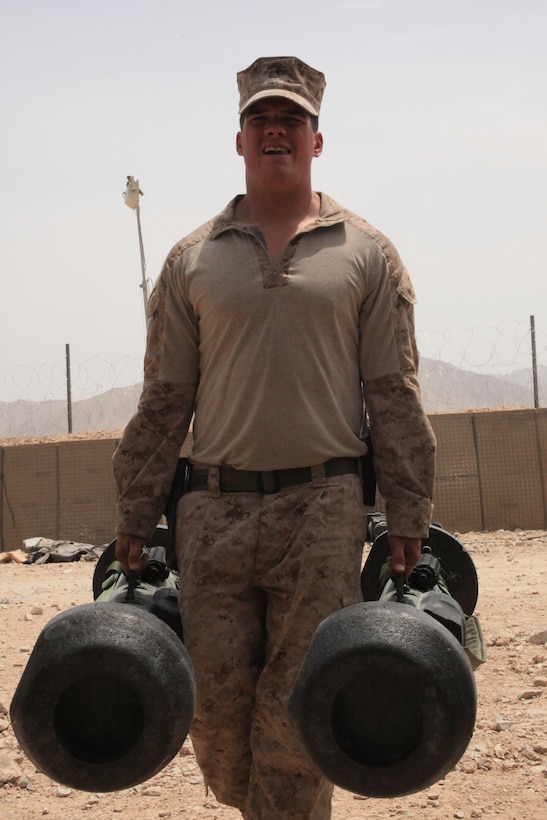 Sgt. Waylon Sliker carries Javelin missiles to the ammunition supply point after they were returned from a recent operation, May 15, 2012. Sliker is responsible for more than $3.2 million in ammunition at Forward Operating Base Whitehouse and dispersed throughout 1st Battalion, 8th Marine Regiment’s area of operations.