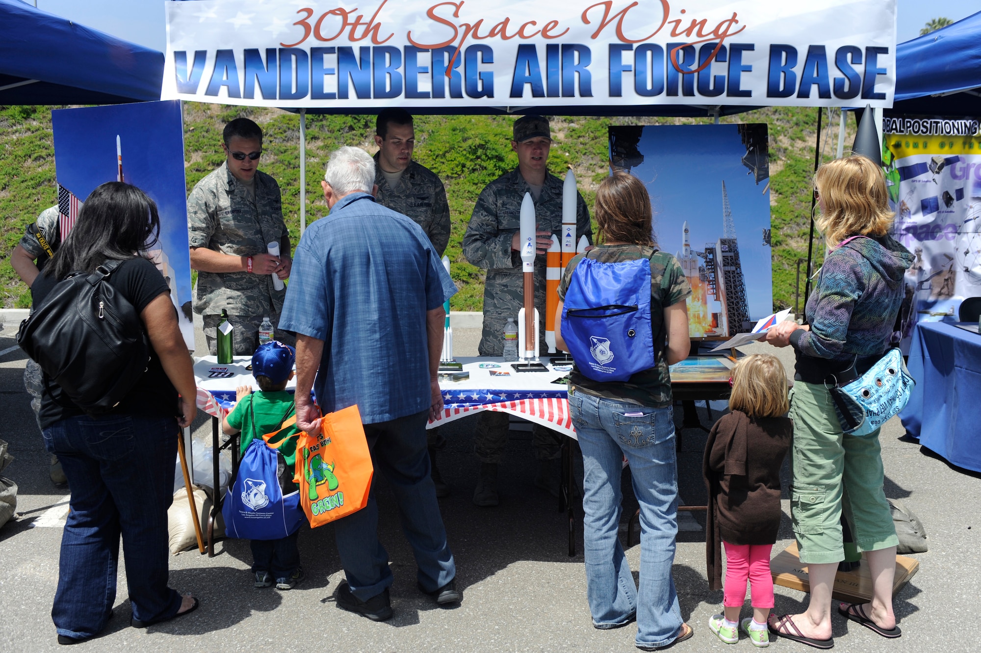 TORRANCE, Calif. -- Team V members inform the public about Vandenberg's launch missions during the 53rd Annual Armed Forces Day here Friday, May 18, 2012. Military displays varied from rockets to tanks and were open for the public. (U.S. Air Force photo/Staff Sgt. Andrew Satran) 
