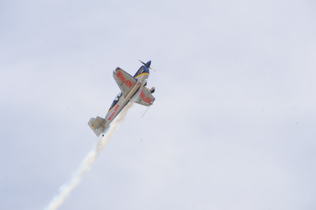 Mike Goulian, a pilot of Good Year’s aerial acrobatic performs aerial stunts at Joint Base Andrews, May 18. This year’s Joint Service Open House (JSOH) celebrates the Centennial of Marine Corps Aviation. JSOH affords the public an opportunity to meet the men and women of the Armed Forces while seeing over 100 static displays and 19 aerial demonstration teams. (U.S. Air Force photo/Airman 1st Class Aaron Stout)