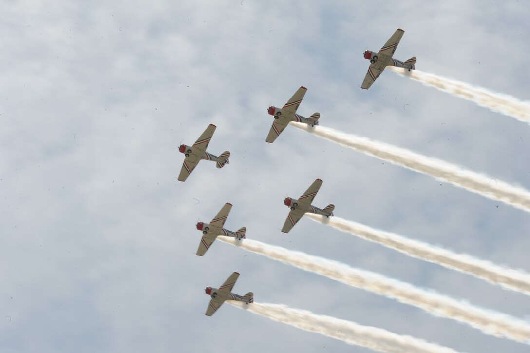 The Geico Skytypers fly in a six man formation at Joint Base Andrews, May 18. This year’s Joint Service Open House (JSOH) celebrates the Centennial of Marine Corps Aviation. JSOH affords the public an opportunity to meet the men and women of the Armed Forces while seeing over 100 static displays and 19 aerial demonstration teams. (U.S. Air Force photo/Airman 1st Class Aaron Stout)