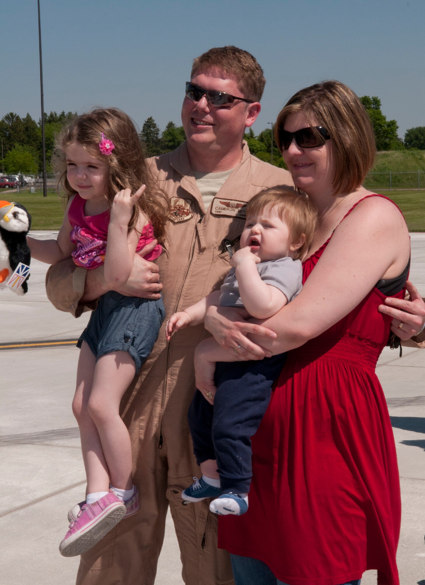 Family and friends greet 133rd Airlift Wing Airmen at the Minneapolis- St. Paul International Airport on May 16, 2012 as they return from a deployment to Southwest Asia. USAF official photo by Senior Master Sgt. Mark Moss