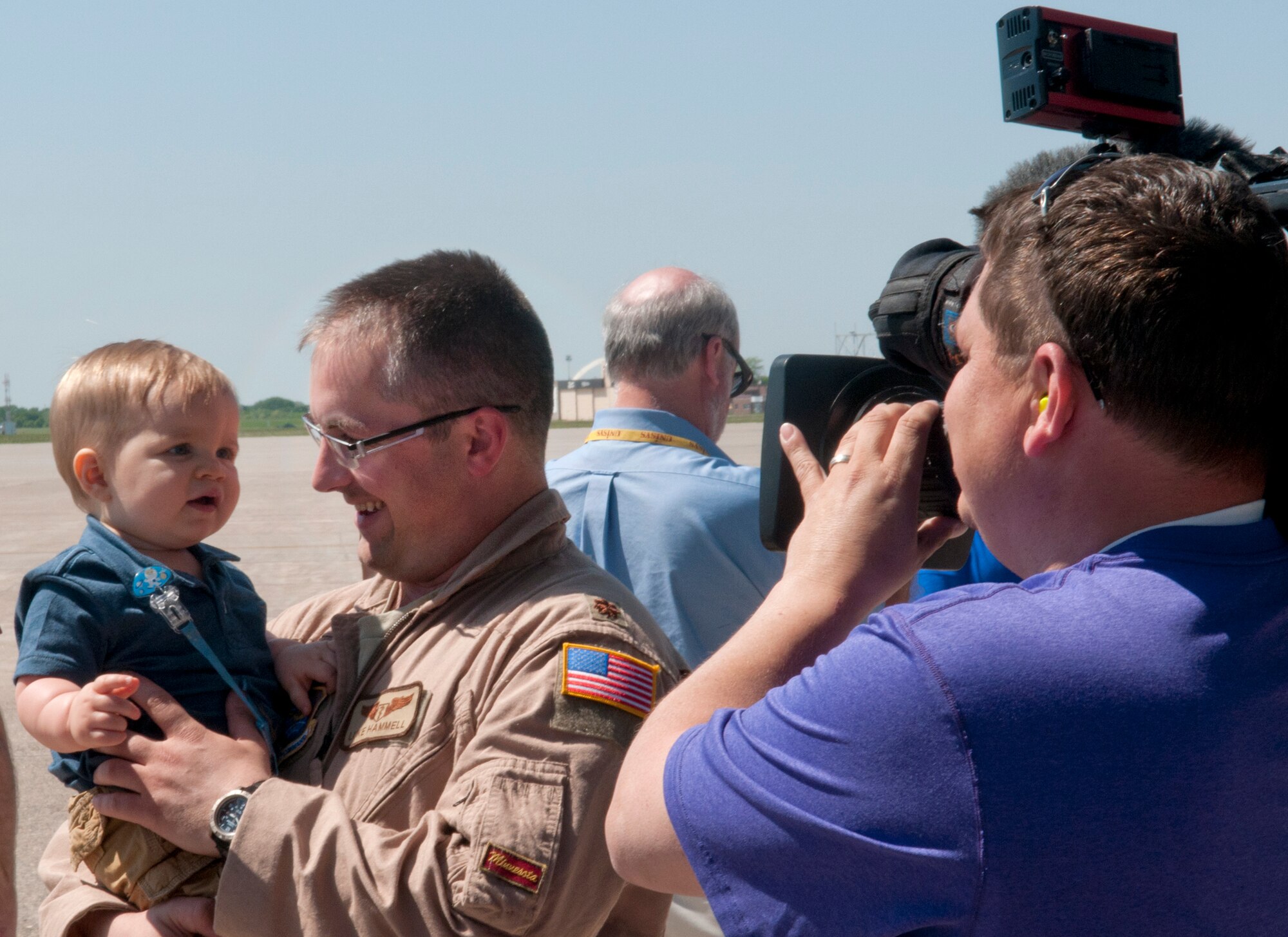 Family and friends greet 133rd Airlift Wing Airmen at the Minneapolis- St. Paul International Airport on May 16, 2012 as they return from a deployment to Southwest Asia. USAF official photo by Senior Master Sgt. Mark Moss