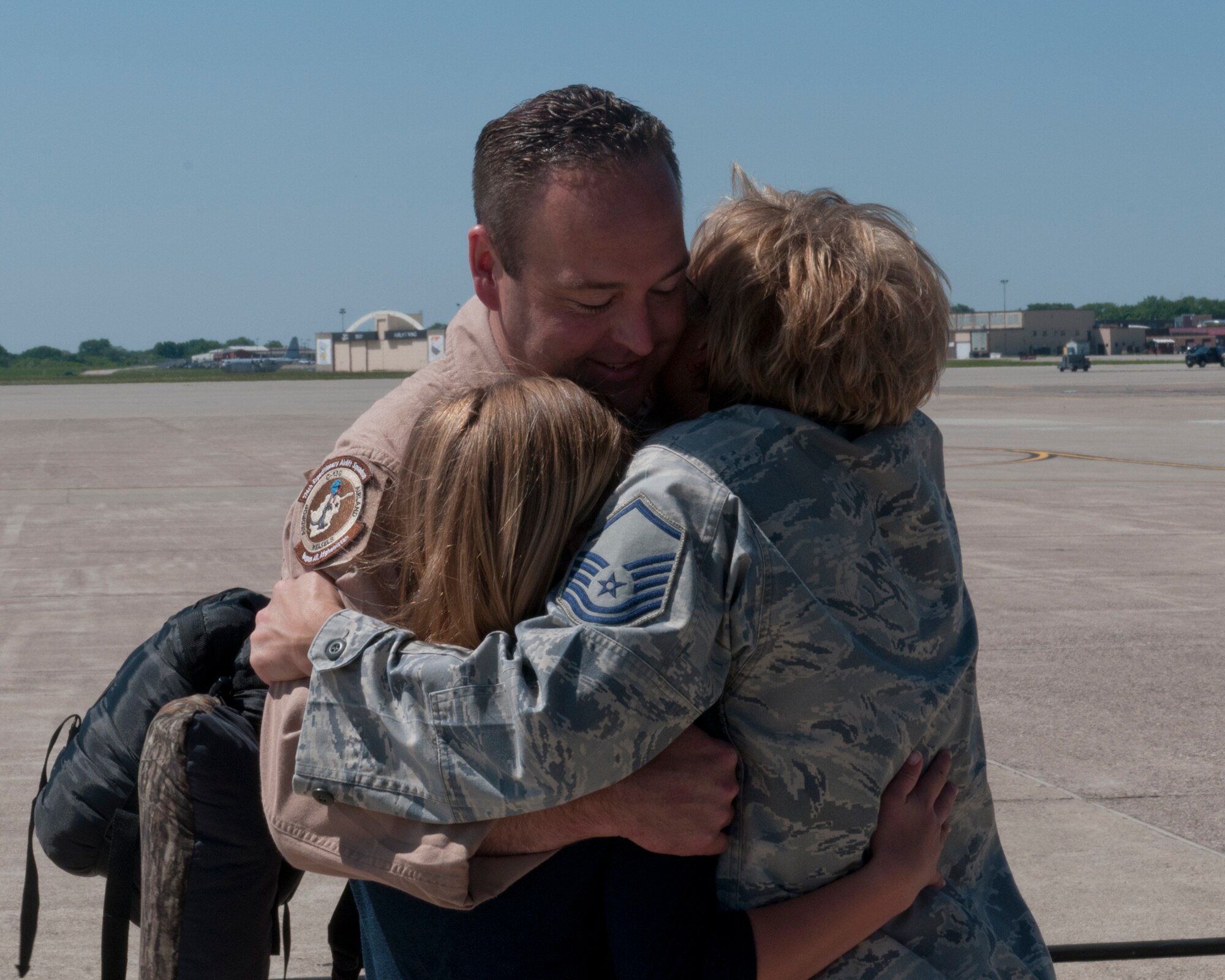 Family and friends greet 133rd Airlift Wing Airmen at the Minneapolis- St. Paul International Airport on May 16, 2012 as they return from a deployment to Southwest Asia. USAF official photo by Senior Master Sgt. Mark Moss