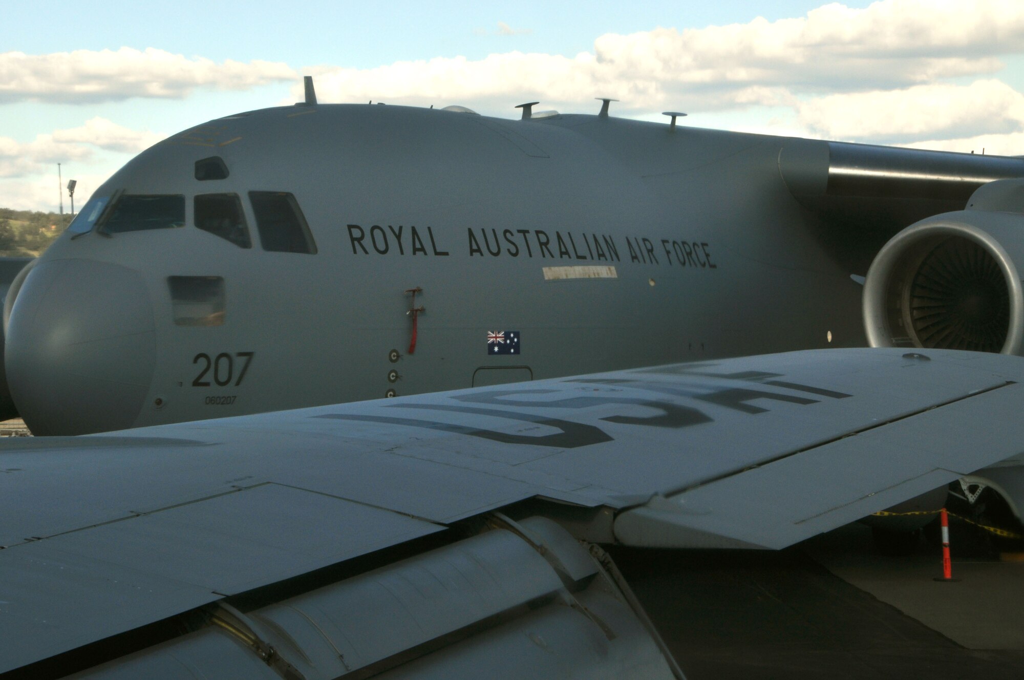 The KC-135 Stratotanker from the 459th Air Refueling Wing at Joint Base Andrews, Md., parks next to the Royal Australian Air Force’s C-130 Hercules, Pearce, Australia, May 18, 2012. The 459 ARW are assisting fellow airmen of the RAAF by having one of their aircraft on display for the Defence Force Air Show, May 19 to 20, 2012. (U.S. Air Force photo/ Senior Airman Katie Spencer)