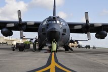 A maintainer pumps liquid oxygen into an MC-130E Combat Talon I on the Duke Field flightline recently.  More commonly referred to by maintainers as the acronym "LOX," the supercooled substance supplies breathable oxygen for aircrews to use above certain altitudes.  (U.S. Air Force photo/Tech. Sgt. Cheryl Foster)  