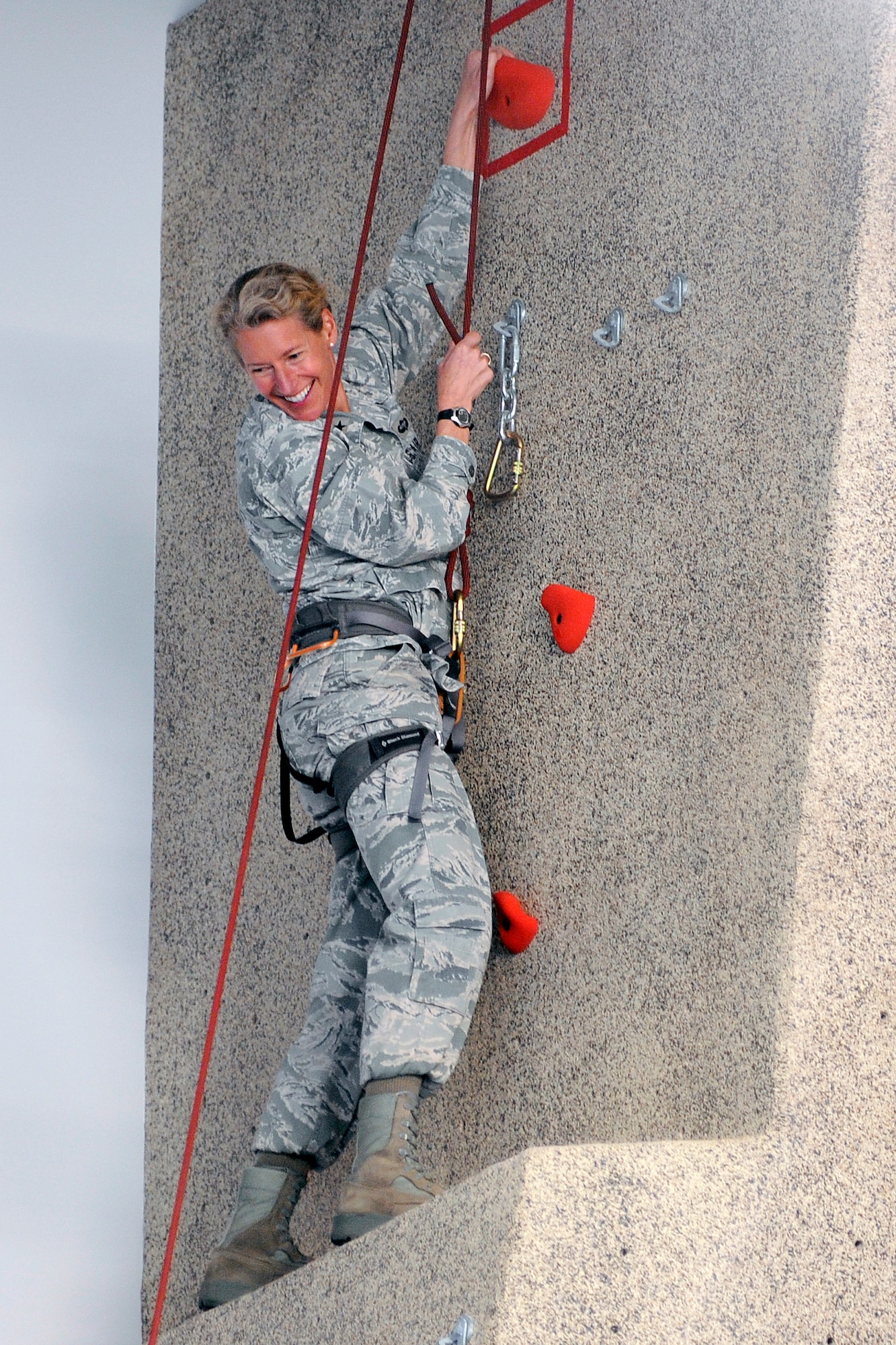 Brig. Gen. Dana Born scales the new climbing wall during the grand opening Wednesday. Born is the Academy’s dean of the faculty. (U.S. Air Force Photo/Mike Kaplan)
