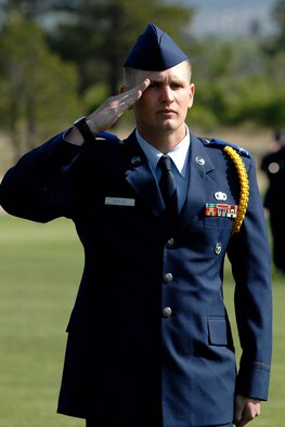 Cadet Candidate Cameron Kistler salutes during the Prep School Parade Sunday.(U.S. Air Force Photo/Mike Kaplan)