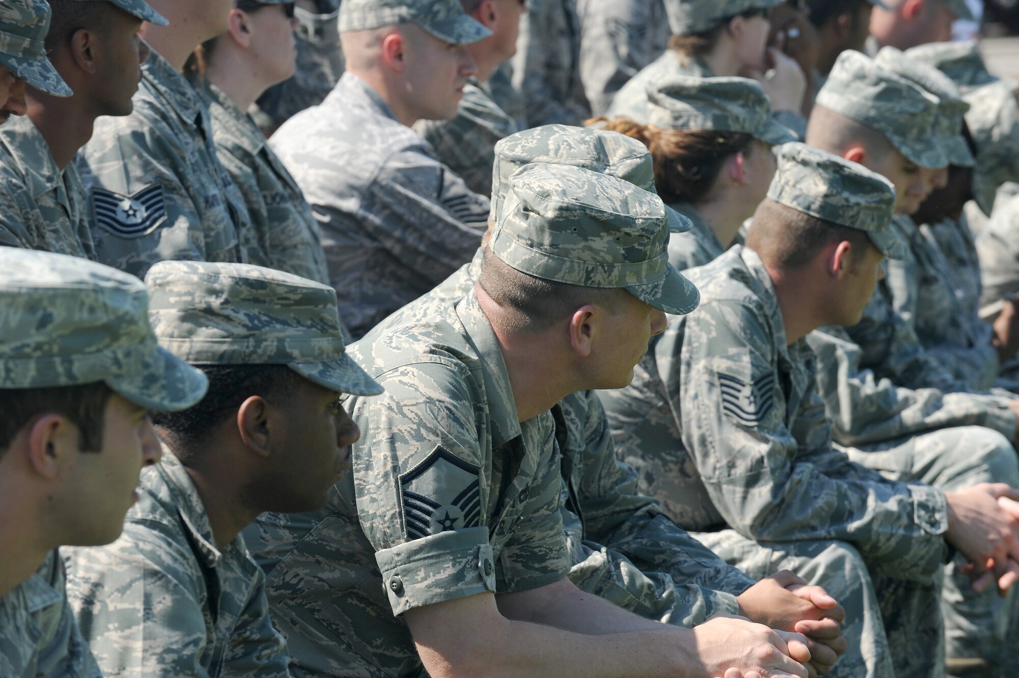 Members of Team Scott listen attentively as Col. Mike Hornitschek, former commander of the 375th Air Mobility Wing, gives his speech during the 375th AMW change of command ceremony May 18 at Scott Air Force Base, Ill. Hornitschek relinquished command as Col. David Almand assumed command. (U.S. Air Force photo/Airman 1st Class Kristina Lynch)