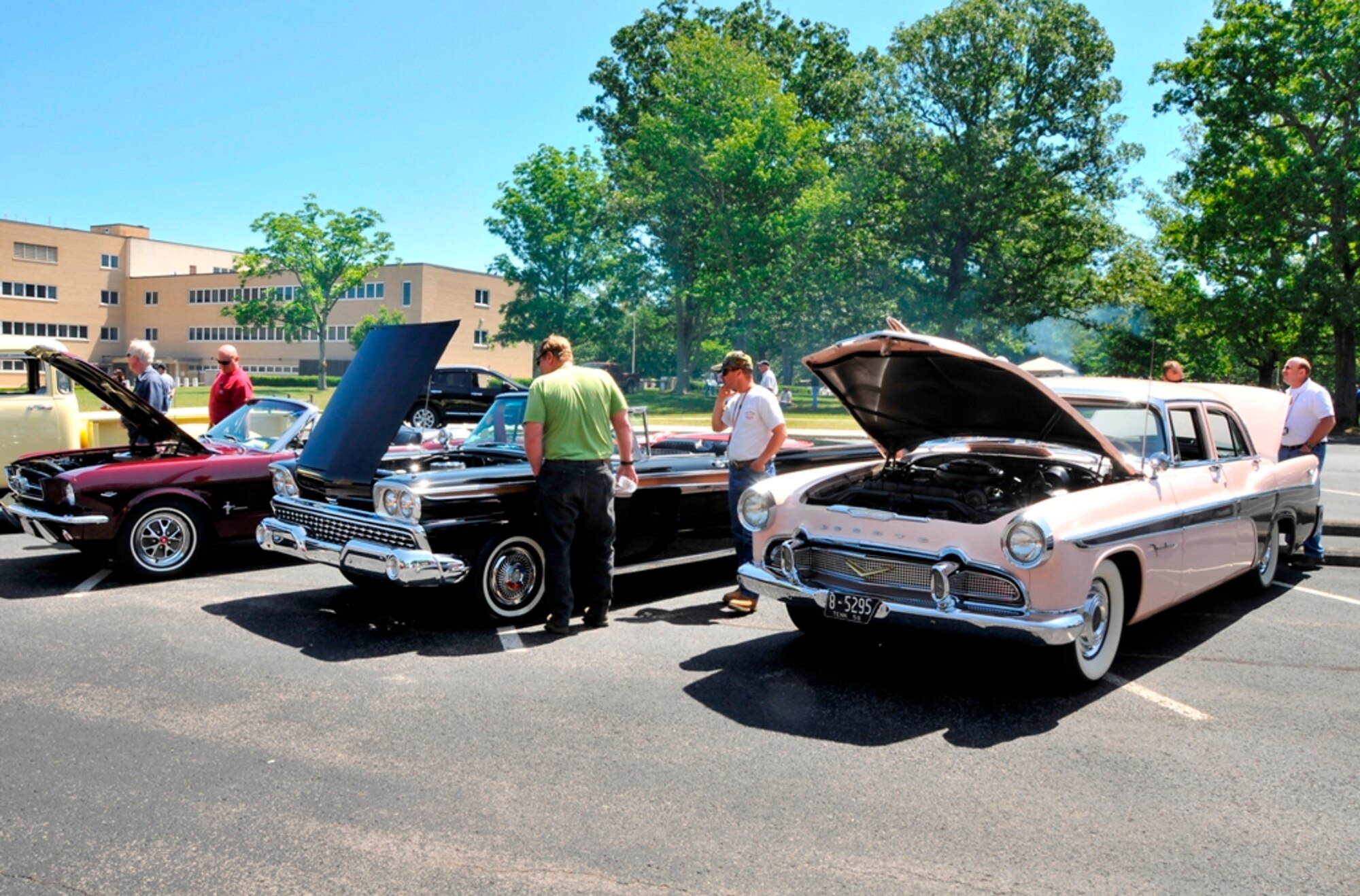 Employees brought cars from all generations to AEDC’s Cruise-In May 11. Employees spent almost two hours walking through the parking lot by the Administration and Engineering Building talking with coworkers about their vehicles. (Photo by Jacqueline Cowan)