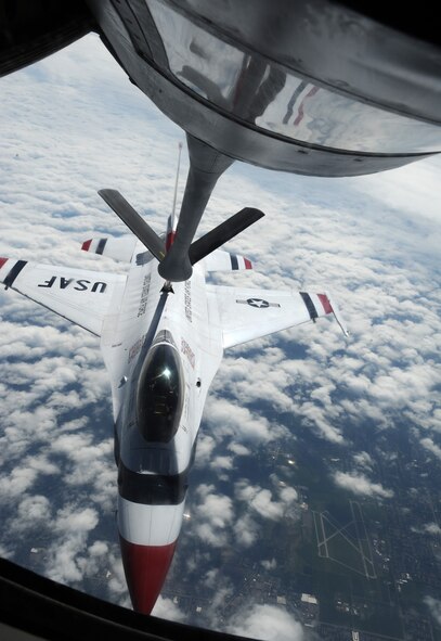 A KC-135 Stratotanker from McConnell Air Force Base, Kan., refuels one of the F-16 Thunderbirds May 14, 2012. The Thunderbirds are the Air Force’s precision-flying demonstration team and will be performing at the Wings over McConnell Air Show and Open House, Sept. 29 and 30. (U.S. Air Force photo/ Airman 1st Class Laura L. Valentine)