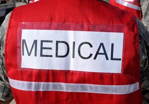 2012 Joint Service Open House and Air Show medics and first-aid station technicians wear bright red medic vests during Joint Base Andrews’ air show weekend, May 18 - 20. Air Show patrons may ask any red-vested attendant or visit one of four flightline comfort stations for help with any medical need throughout the weekend. (U.S. Air Force photo/Senior Airman Lindsey A. Porter)