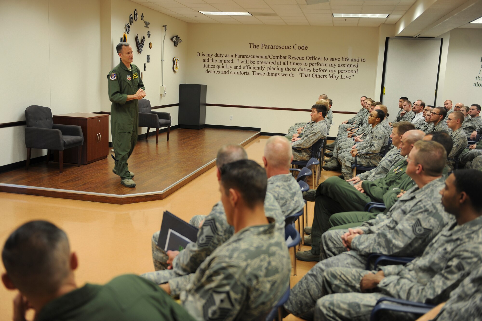 U.S. Air Force Col. Billy Thompson, 23d Wing commander, speaks to Airmen assigned to the 563d Rescue Group during a commander’s call at Davis-Monthan Air Force Base, Ariz., May 10, 2012. Prior to taking the reigns as wing commander at Moody, Thompson was commander of the 563d RQG. (U.S. Air Force photo by Staff Sgt. Ciara Wymbs/Released)  