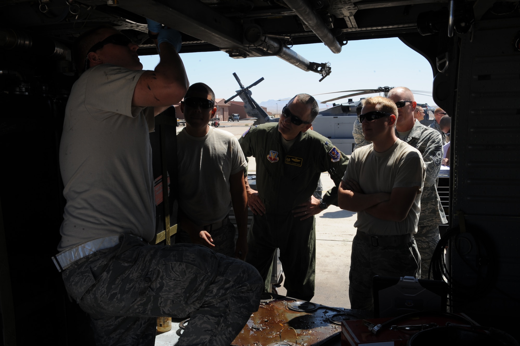 U.S. Air Force Col. Billy Thompson, 23d Wing commander, and Chief Master Sgt. Frank Batten, 23d Wing command chief, receive an orientation from Airmen at Nellis Air Force Base, Nev., May 7, 2012. Thompson and Batten spent a week with Airmen at geographically separated units at Nellis and Davis-Monthan Air Force Base, Ariz. (U.S. Air Force photo by Staff Sgt. Ciara Wymbs/Released) 